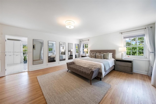 441 Grand Concourse, Miami Shores, FL 33138 - bedroom with multiple windows and light wood-style flooring