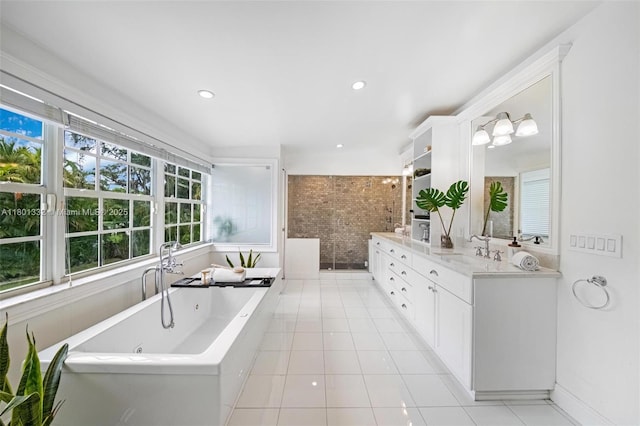 441 Grand Concourse, Miami Shores, FL 33138 - bathroom featuring double vanity, a jetted tub, tile patterned floors, tiled shower, and recessed lighting