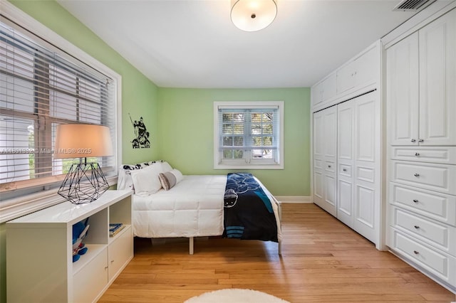 441 Grand Concourse, Miami Shores, FL 33138 - bedroom with light wood-style flooring and a closet
