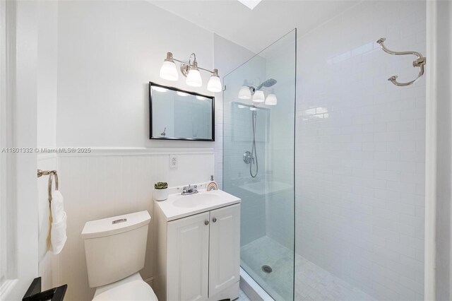 441 Grand Concourse, Miami Shores, FL 33138 - bathroom with a walk in shower, vanity, and a wainscoted wall