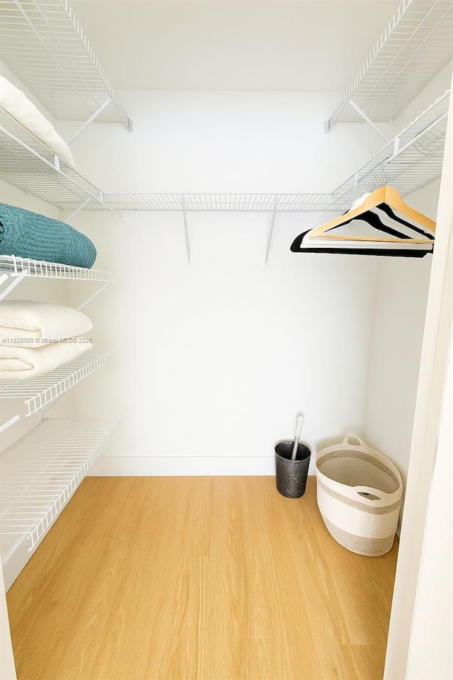 6301 Collins Ave Unit 1005, Miami Beach, FL 33141 - spacious closet featuring wood finished floors