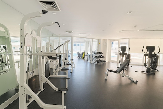 6301 Collins Ave Unit 1005, Miami Beach, FL 33141 - exercise room with floor to ceiling windows