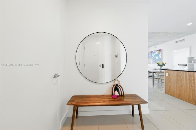 3301 NE 1st Ave Unit H2104, Miami, FL 33137 - corridor featuring light tile patterned floors and baseboards