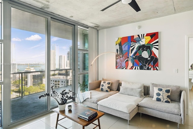 3301 NE 1st Ave Unit H2104, Miami, FL 33137 - tiled living area featuring plenty of natural light, a wall of windows, a ceiling fan, a view of city, and a water view