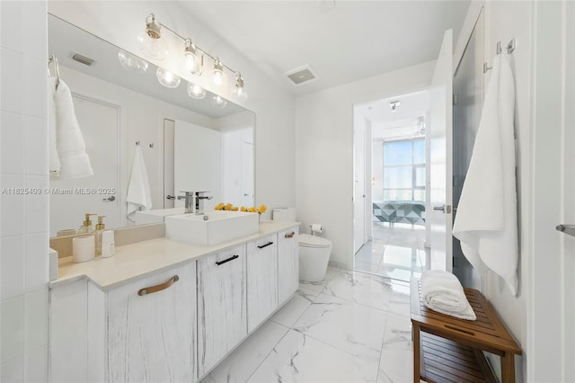 3301 NE 1st Ave Unit H2104, Miami, FL 33137 - bathroom with vanity and marble finish flooring
