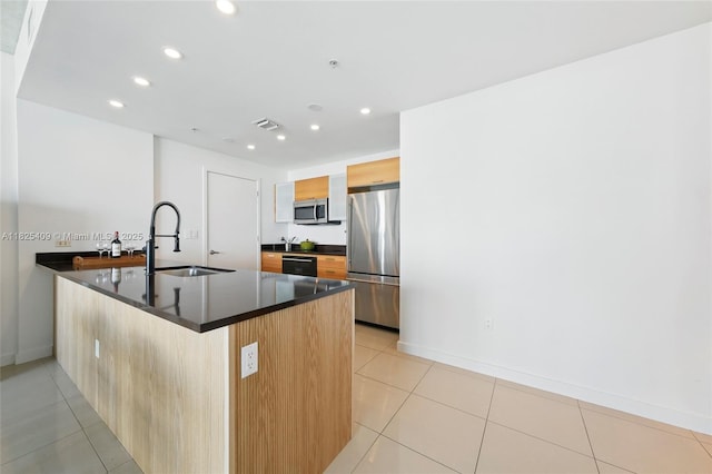 3301 NE 1st Ave Unit H2104, Miami, FL 33137 - kitchen with stainless steel appliances, dark countertops, recessed lighting, a peninsula, and light tile patterned floors