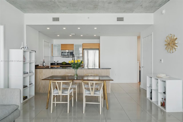 3301 NE 1st Ave Unit H2104, Miami, FL 33137 - dining space featuring light tile patterned flooring and recessed lighting