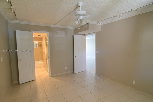 9420 Poinciana Pl Unit 115, Davie, FL 33324 - spare room featuring track lighting, crown molding, a textured ceiling, light tile patterned floors, and a ceiling fan