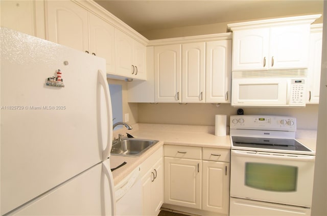 9420 Poinciana Pl Unit 115, Davie, FL 33324 - kitchen featuring white appliances, light countertops, and white cabinetry
