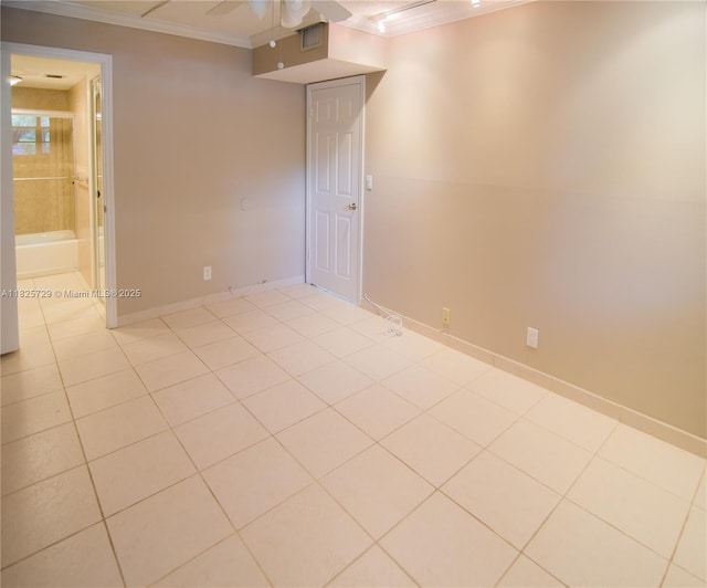 9420 Poinciana Pl Unit 115, Davie, FL 33324 - empty room with ornamental molding, light tile patterned floors, and a ceiling fan