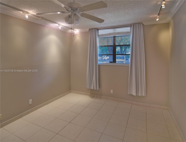 9420 Poinciana Pl Unit 115, Davie, FL 33324 - spare room with rail lighting, a textured ceiling, ornamental molding, ceiling fan, and light tile patterned floors