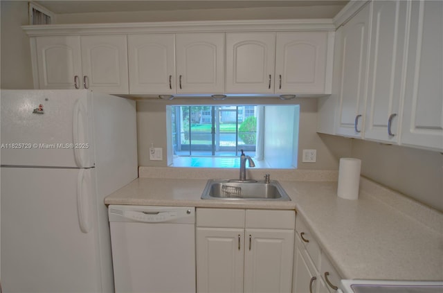 9420 Poinciana Pl Unit 115, Davie, FL 33324 - kitchen with white appliances, white cabinets, and light countertops