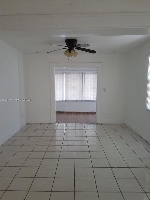 559 NW 44th St, Miami, FL 33127 - spare room featuring ceiling fan and light tile patterned floors