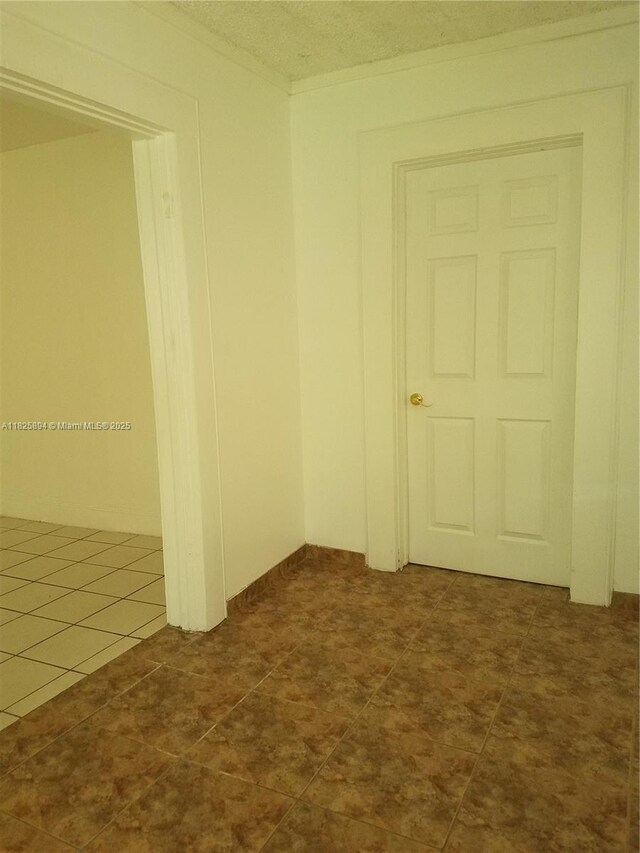 559 NW 44th St, Miami, FL 33127 - unfurnished room with crown molding