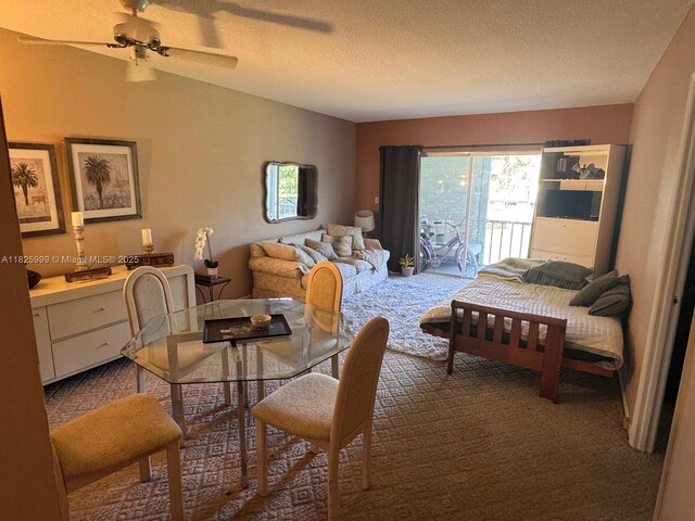 5200 Washington St Unit 207, Hollywood, FL 33021 - dining area featuring plenty of natural light, carpet floors, a textured ceiling, and ceiling fan
