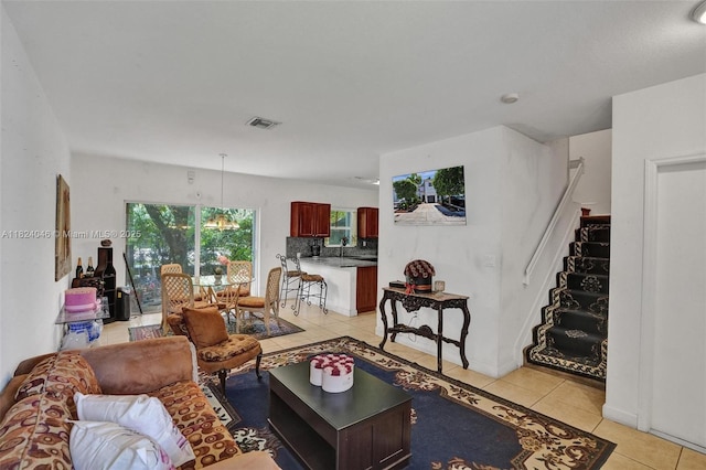 14844 SW 9th Ln, Miami, FL 33194 - living area with light tile patterned flooring and stairway