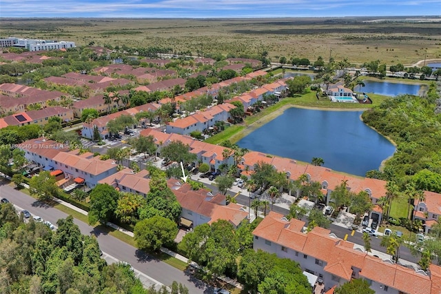 14844 SW 9th Ln, Miami, FL 33194 - aerial view of property's location featuring a large body of water and nearby suburban area