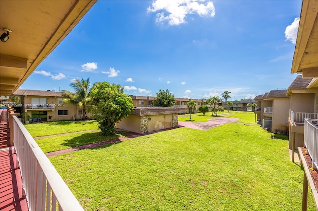 301 NW 177th St Unit 227, Miami Gardens, FL 33169 - view of grassy yard featuring a residential view