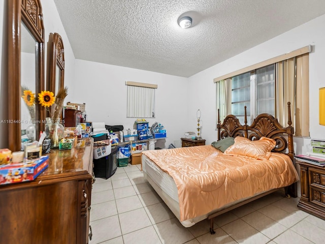 17430 SW 92nd Ct, Palmetto Bay, FL 33157 - bedroom featuring a textured ceiling and light tile patterned flooring