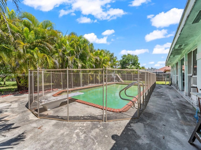 17430 SW 92nd Ct, Palmetto Bay, FL 33157 - view of swimming pool with a fenced backyard and a patio