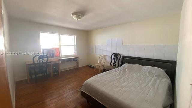 1843 Wiley St, Hollywood, FL 33020 - bedroom featuring wood finished floors