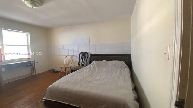1843 Wiley St, Hollywood, FL 33020 - bedroom featuring wood finished floors and baseboards