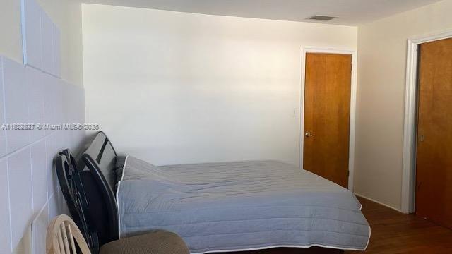 1843 Wiley St, Hollywood, FL 33020 - bedroom with wood finished floors