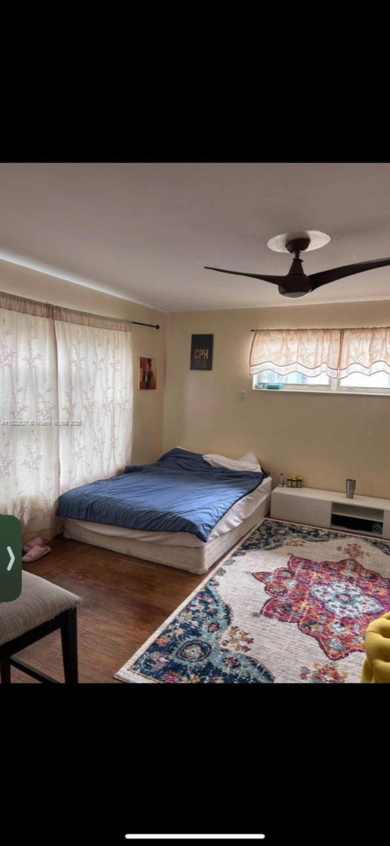 1843 Wiley St, Hollywood, FL 33020 - bedroom featuring wood finished floors and ceiling fan