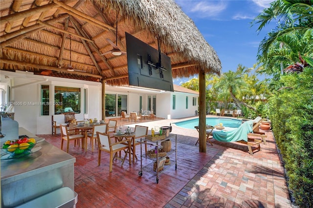 14241 SW 30th St, Miami, FL 33175 - swimming pool with outdoor dining space, a gazebo, and a patio
