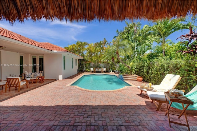 14241 SW 30th St, Miami, FL 33175 - view of pool with a patio, french doors, and an outdoor living space