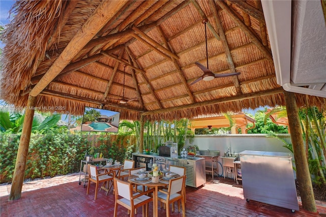 14241 SW 30th St, Miami, FL 33175 - fenced backyard with a gazebo, area for grilling, ceiling fan, outdoor dining space, and a deck