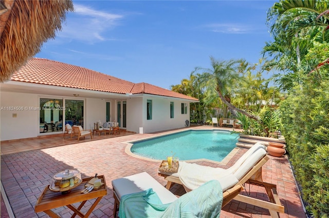 14241 SW 30th St, Miami, FL 33175 - swimming pool featuring an outdoor hangout area and a patio