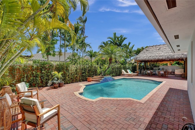 14241 SW 30th St, Miami, FL 33175 - view of swimming pool with a gazebo, a patio area, and a fenced backyard