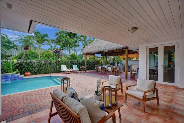 14241 SW 30th St, Miami, FL 33175 - view of patio with french doors, an outdoor hangout area, and a gazebo