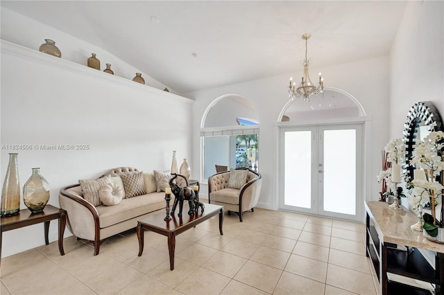 14241 SW 30th St, Miami, FL 33175 - living room with a chandelier, light tile patterned floors, french doors, and lofted ceiling