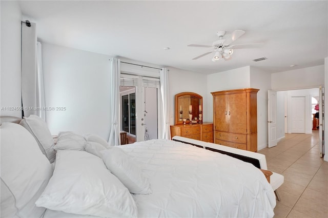 14241 SW 30th St, Miami, FL 33175 - bedroom featuring light tile patterned floors and a ceiling fan