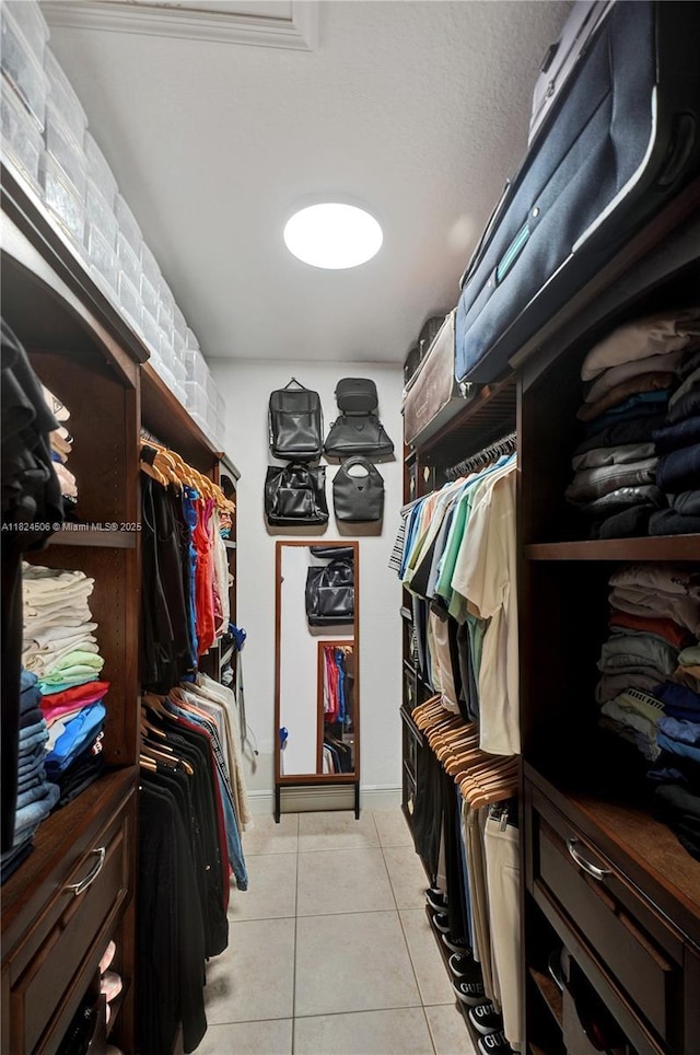 14241 SW 30th St, Miami, FL 33175 - walk in closet featuring light tile patterned flooring