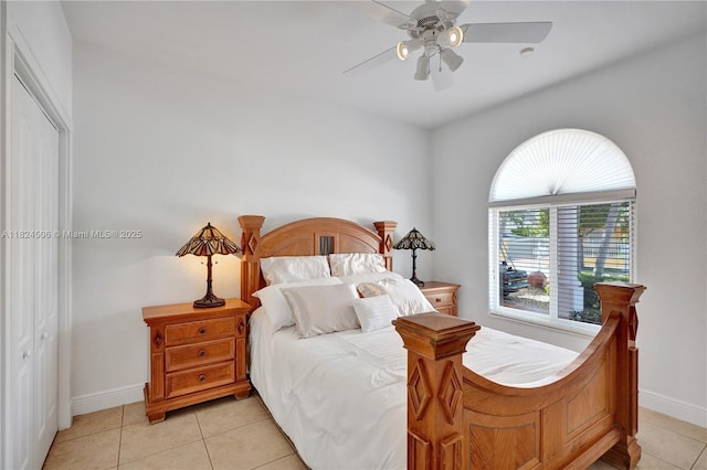 14241 SW 30th St, Miami, FL 33175 - bedroom featuring light tile patterned floors, ceiling fan, and a closet