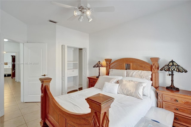 14241 SW 30th St, Miami, FL 33175 - bedroom featuring light tile patterned floors, ceiling fan, and connected bathroom