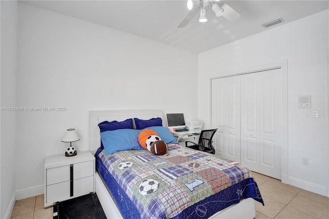 14241 SW 30th St, Miami, FL 33175 - bedroom with light tile patterned floors, a closet, and ceiling fan