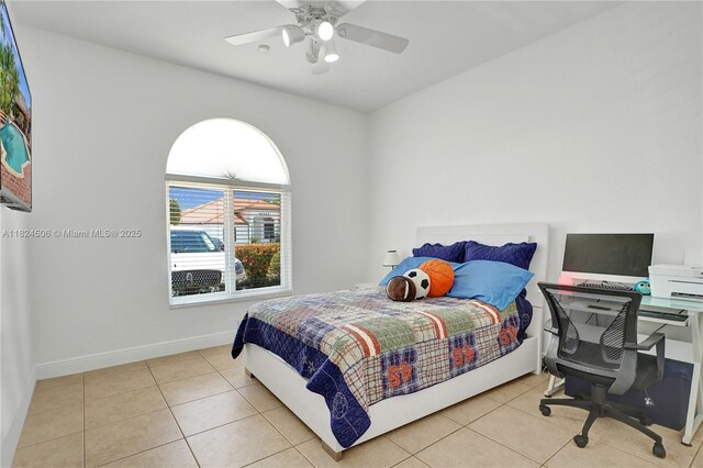 14241 SW 30th St, Miami, FL 33175 - tiled bedroom with ceiling fan and an office area