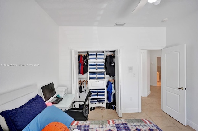14241 SW 30th St, Miami, FL 33175 - bedroom with tile patterned floors, a closet, and a ceiling fan