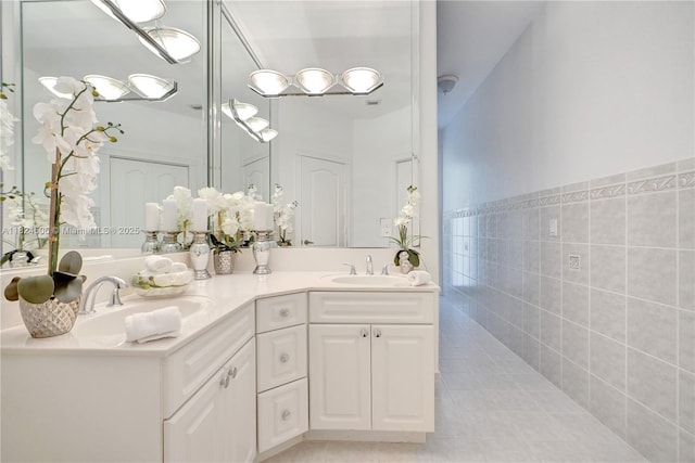 14241 SW 30th St, Miami, FL 33175 - bathroom featuring double vanity and tile patterned flooring