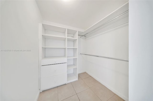 7830 Dickens Ave Unit 504, Miami Beach, FL 33141 - spacious closet featuring light tile patterned floors