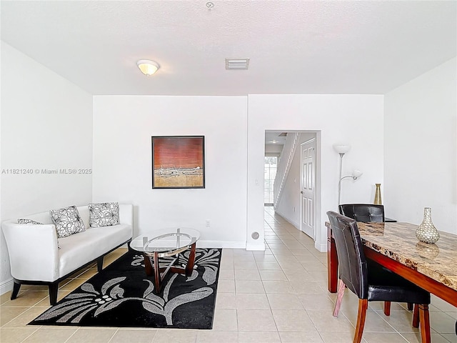 1214 SW 147th Ter, Pembroke Pines, FL 33027 - living area with light tile patterned floors and baseboards