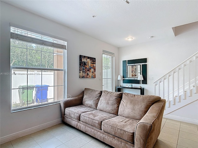 1214 SW 147th Ter, Pembroke Pines, FL 33027 - living area featuring light tile patterned flooring and stairs