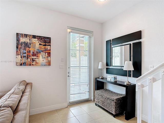 1214 SW 147th Ter, Pembroke Pines, FL 33027 - doorway with tile patterned floors and baseboards