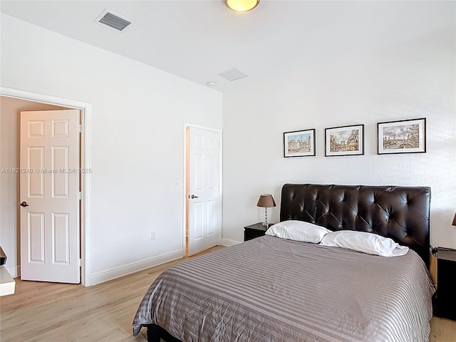 1214 SW 147th Ter, Pembroke Pines, FL 33027 - bedroom featuring light wood-style floors and baseboards