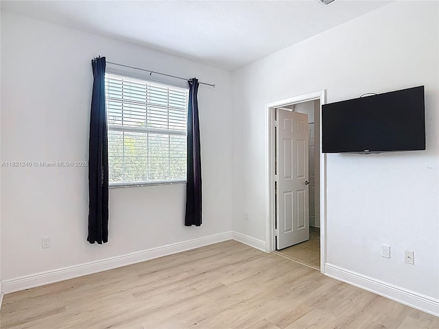 1214 SW 147th Ter, Pembroke Pines, FL 33027 - unfurnished bedroom featuring light wood-style flooring