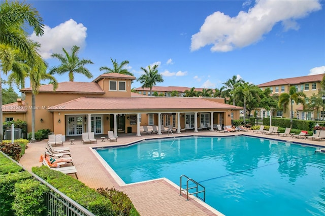1214 SW 147th Ter, Pembroke Pines, FL 33027 - community pool featuring french doors and a patio